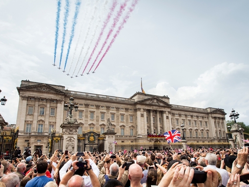 Aerial display flying over crowds above palace