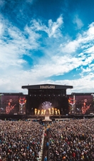 A large crowd watching a performance at Download Festival's main stage