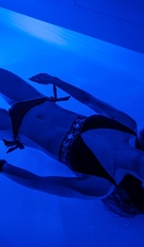 A woman in a flotation tank