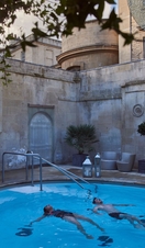 Women swimming in a swimming pool at a spa