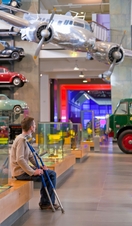 Man sat with crutches leaning on his shoulders