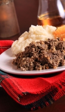 Scottish Haggis Table Setting For A Burns Night Dinner With A Royal Stuart Tartan Napkin Celebrating The Birthday Of Robert Burns The Scottish Poet