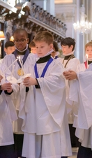 St Paul's Choristers lighting candles at Christmas