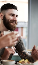 Group of friends in urban cafe