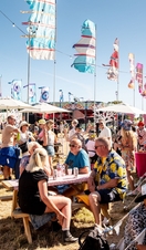 People enjoying a summer music festival