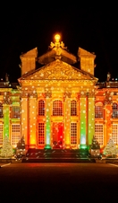 Festive Christmas lights shining onto Blenheim Palace