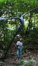 Nicola Godden artist with her sculpture Theia Goddess of light at The Sculpture Park