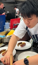 Chef preparing food in restaurant