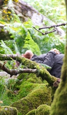 Bearded Woodsman Among the Twisted, Gnarly, Stunted Moss Covered Sessile Oak Trees (Quercus petraea) of Wistmans Wood. Dartmoor, Devon, UK.