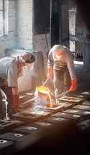A group of workers pouring steel at Ironbridge Gorge, one of the starting places of the Industrial Revolution