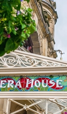 The stained glass signage on the front of Buxton Opera House, Derbyshire, UK