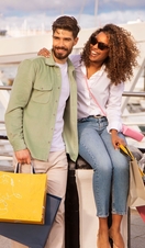 Two people with shopping bags