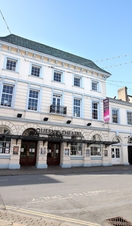 An exterior view of the Queen's Theatre in Devon