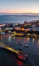 Twilight evening view to Tenby harbour from above