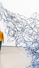A child looking at an art exhibit in Leeds Art Gallery