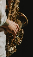 Midsection Of Man Playing At Music Concert