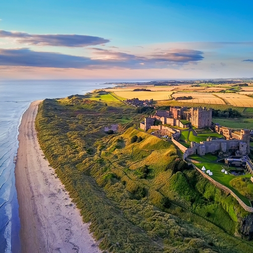 Aerial view of Bamburgh Castle on the coast of Northumberland