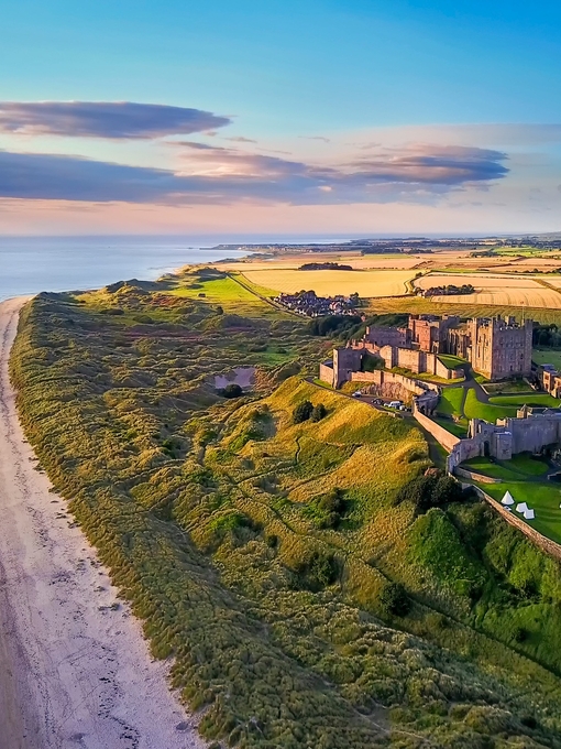 Aerial view of Bamburgh Castle on the coast of Northumberland