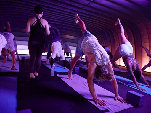 A yoga class being undertaken at Hotpod Yoga in Glasgow