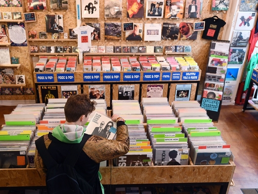 A man looks through records at Spillers Records in Cardiff