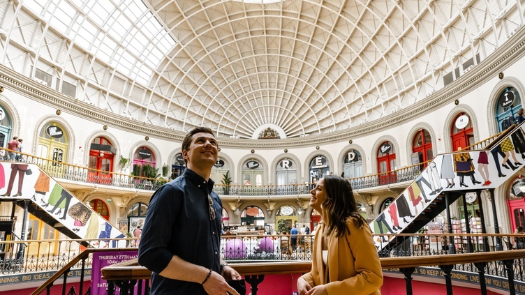 People looking around the interior of Leeds Corn Exchange