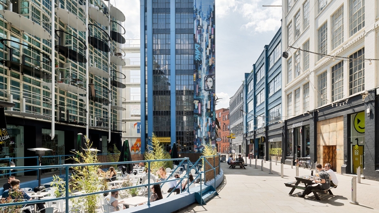 People sitting down at Digbeth Estate