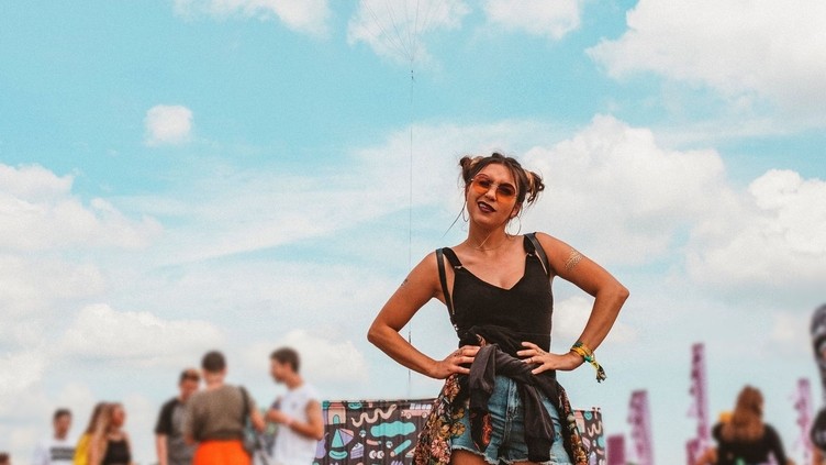 Woman posing with her hands on her hips at Parklife Festival